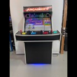 4 Player Arcade Machine, 32 screen, 120w sub, 5000 games, Illuminated Buttons, RGBW LEDs Underneath 4 Player Arcade Machine, 32 screen, 120w sub, 5000 games, Illuminated Buttons, RGBW LEDs Underneath